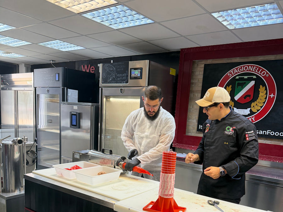 Stagionello training lab in Italy with curing cabinets and stainless work tables